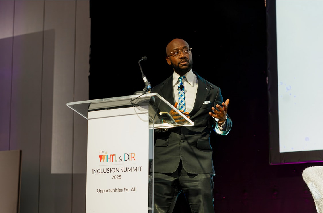 Speaker at conference podium